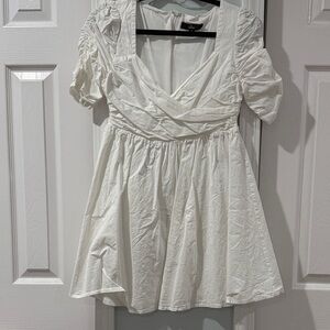 Lulu’s cute white mini dress